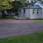 Gravel Paved crushed asphalt for Dave's spec home gravel driveway in Norton Shores.  This is the parking area/turn around.