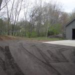 Gravel Paving Complete - Crushed Asphalt spread and rolled.