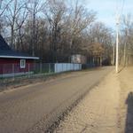 Driveway complete in Grand Haven, installed 125 ton of Crushed Asphalt.  Carved out a shallow swale on each side of drive for proper drainage.